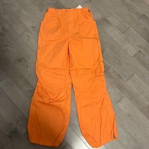 NWT Orange Cargo Pants with adjustable ankle, Size small